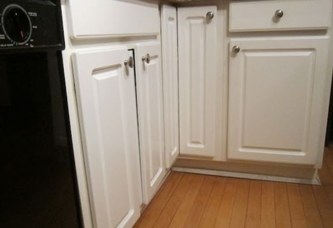 white coloured particle board kitchen cabinet