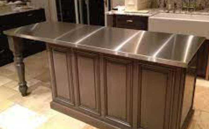 a steel counter used for the top surface of a kitchen island