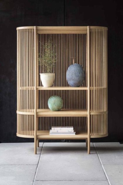 cane shelf set up with decor vases 