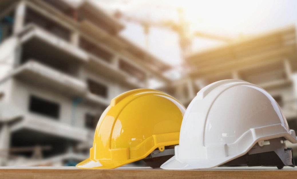 two industrial safety helmets