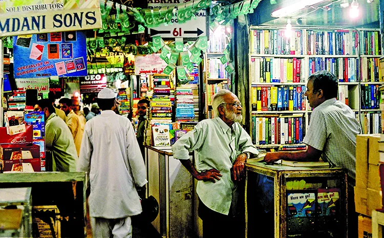 Man standing at shop in Urdu bazar Kaarchi